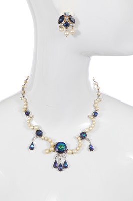 Lot 585 - A Schiaparelli parure of faceted green glass stones, 1960s