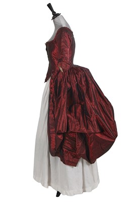 Lot 520 - A shot black/burgundy taffeta robe à l'anglaise, 1775-85