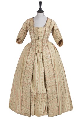 Lot 523 - A striped brocaded green and pink silk robe à la Française, and petticoat, 1770-75
