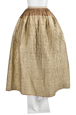 Lot 531 - A quilted golden-tan silk petticoat, 18th century with 19th century alterations