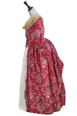 Lot 524 - A fuchsia-pink brocaded silk robe à l'anglaise, the silk 1755-60, the construction 1770s