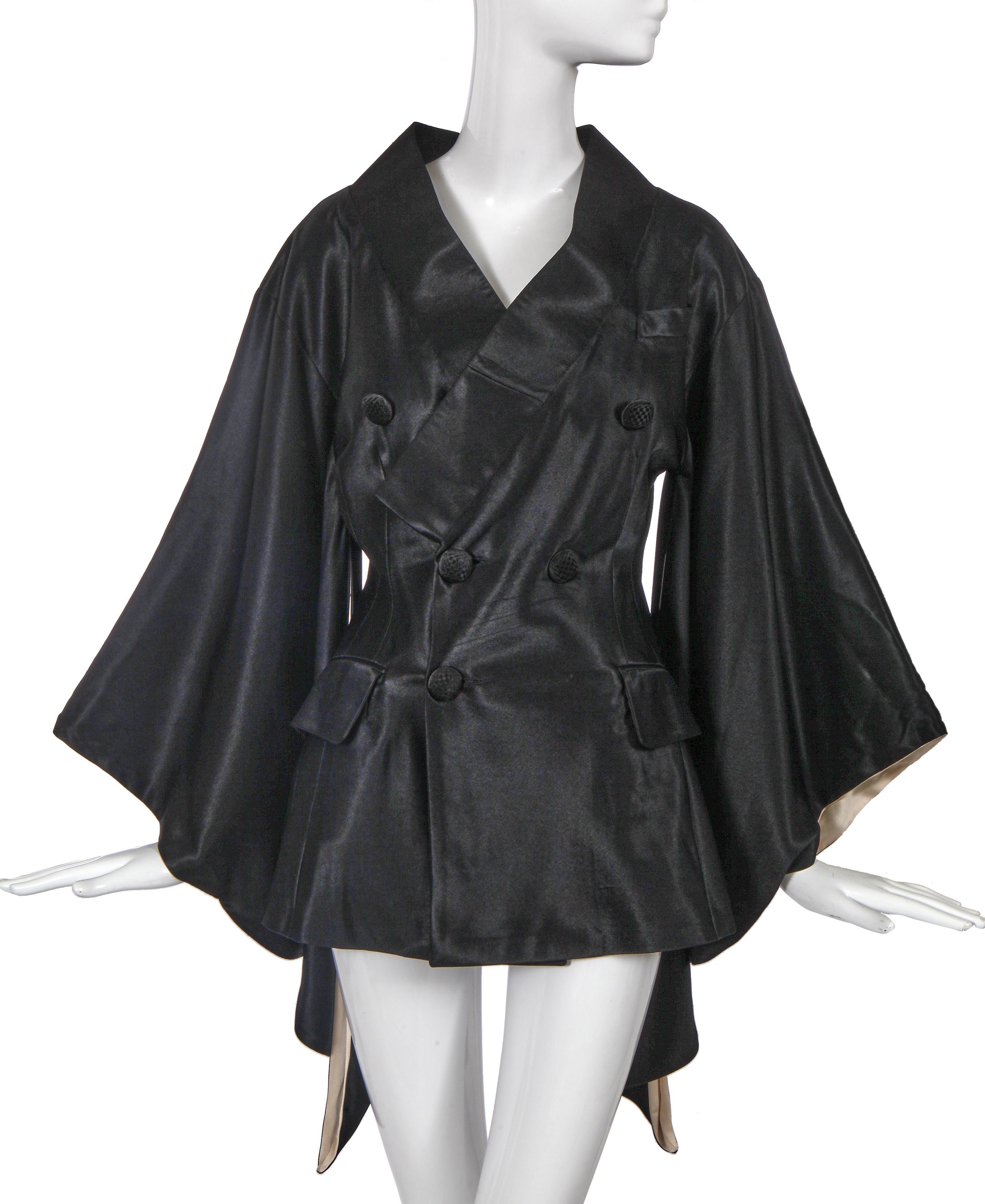 Lot 190 - A John Galliano black satin Minimono, 'Black'