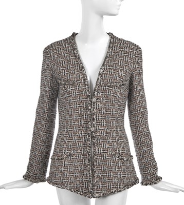 Lot 19 - A Chanel by Karl Lagerfeld brown and black tweed jacket, 'Paris-Dallas' collection, Métiers d'Art, Pre-Fall 2014