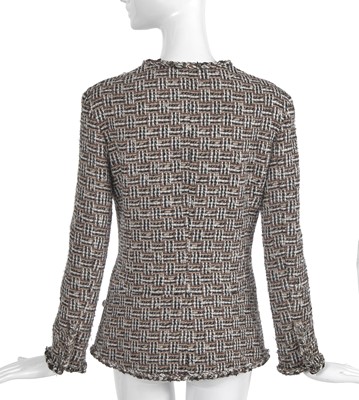 Lot 19 - A Chanel by Karl Lagerfeld brown and black tweed jacket, 'Paris-Dallas' collection, Métiers d'Art, Pre-Fall 2014