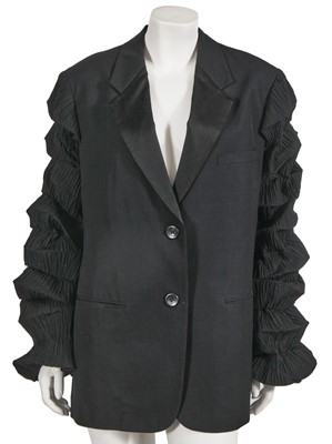 Lot 442 - An Issey Miyake black wool 'Flying Saucer' blazer, Spring-Summer 1994