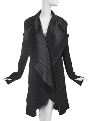 Lot 147 - An Issey Miyake black pleated polyester coat, Autumn-Winter 1990-91