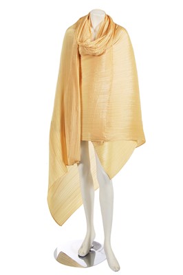 Lot 420 - An Issey Miyake yellow pleated polyester cloak, circa 1997