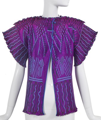 Lot 323 - A Zandra Rhodes printed pleated satin jacket, 'Mexican' collection, Autumm-Winter 1976-77
