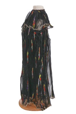 Lot 645 - A rare Thea Porter black and multicoloured floral silk child's dress, 1970s