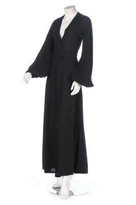 Lot 185 - An Ossie Clark black crêpe 'Cuddly' wrap-over...