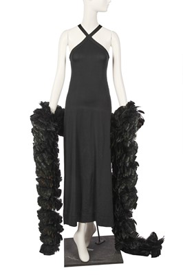 Lot 134 - Peggy Moffitt's Rudi Gernreich black lycra maxi dress and feather boa, circa 1970