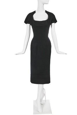 Lot 433 - A Christian Dior haute couture black wool cocktail dress, 'Muguet' line, Spring-Summer 1954