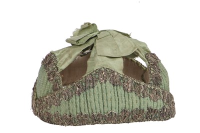 Lot 518 - A rare infant's pudding cap, second half of the 18th century