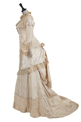 Lot 832 - An ivory silk faille bridal gown, circa 1880