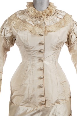 Lot 832 - An ivory silk faille bridal gown, circa 1880