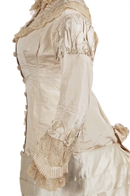 Lot 832 - An ivory silk faille bridal gown, circa 1880