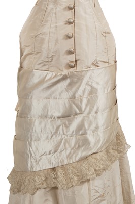 Lot 832 - An ivory silk faille bridal gown, circa 1880