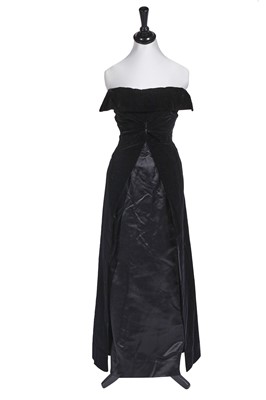 Lot 411 - A Christian Dior by Yves Saint Laurent black velvet and satin evening gown, circa 1960