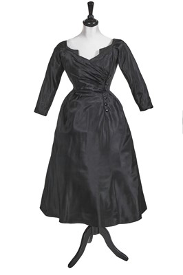Lot 436 - A Jacques Fath haute couture black taffeta 'Cithare' dress, Spring-Summer 1952