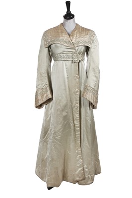 Lot 474 - A Liberty & Co pale aqua and ivory satin evening coat, 1905-08