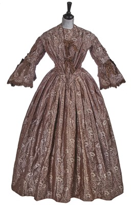 Lot 500 - A silk damask dress worn as a bridal gown, circa 1850