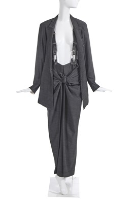 Lot 169 - A Jean Paul Gaultier grey wool sarong-trouser suit, 'Les Tatouages’ collection, Spring-Summer 1994
