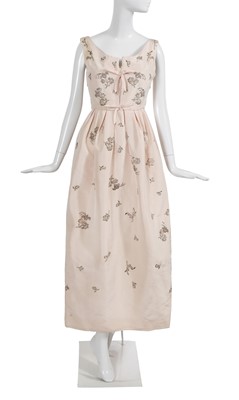 Lot 405 - A Christian Dior London by Marc Bohan embroidered blush faille 'Soirée Brillante' dress, Autumn-Winter 1960-61