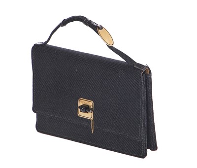 Lot 44 - A Cartier black woven wool bag, 1930s