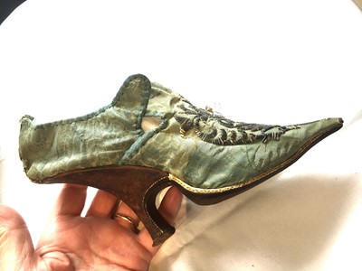 Lot 535 - A rare pair of high fashion silk damask shoes, French, 1720-30