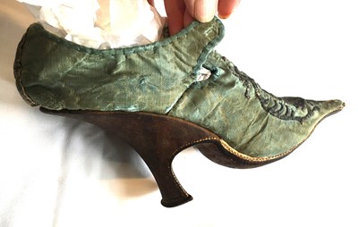 Lot 535 - A rare pair of high fashion silk damask shoes, French, 1720-30