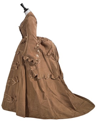 Lot 854 - A satin-trimmed brown silk faille day/reception dress, early 1870s