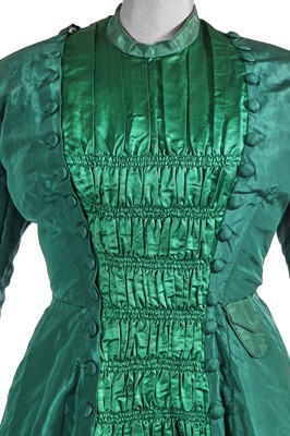 Lot 838 - A green faille and satin evening gown, circa 1879