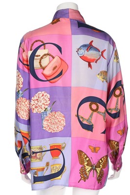 Lot 72 - A Gucci printed silk blouse, late 1980s-early...