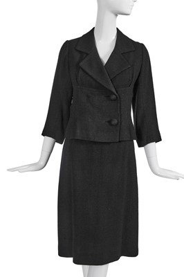 Lot 718 - A Cristóbal Balenciaga haute couture black wool suit, 1961