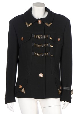 Lot 79 - A Gianni Versace bondage-style black wool...