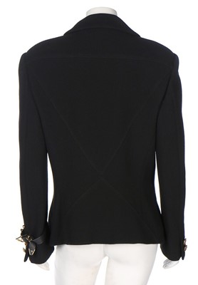 Lot 79 - A Gianni Versace bondage-style black wool...