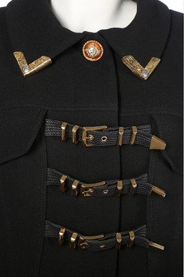 Lot 79 - A Gianni Versace bondage-style black wool...