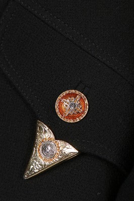 Lot 79 - A Gianni Versace bondage-style black wool...