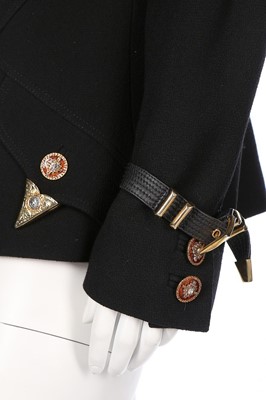 Lot 79 - A Gianni Versace bondage-style black wool...