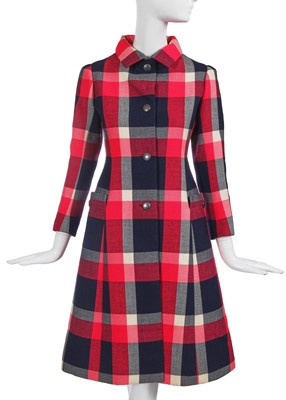 Lot 414 - A Hubert de Givenchy haute couture boldly checked day coat, 1969