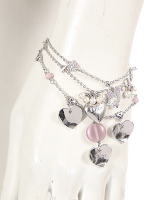 Lot 235 - A Christian Dior by John Galliano necklace and three bracelets, 2000s