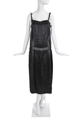 Lot 527 - A Jeanne Lanvin beaded black silk evening dress, Summer 1921