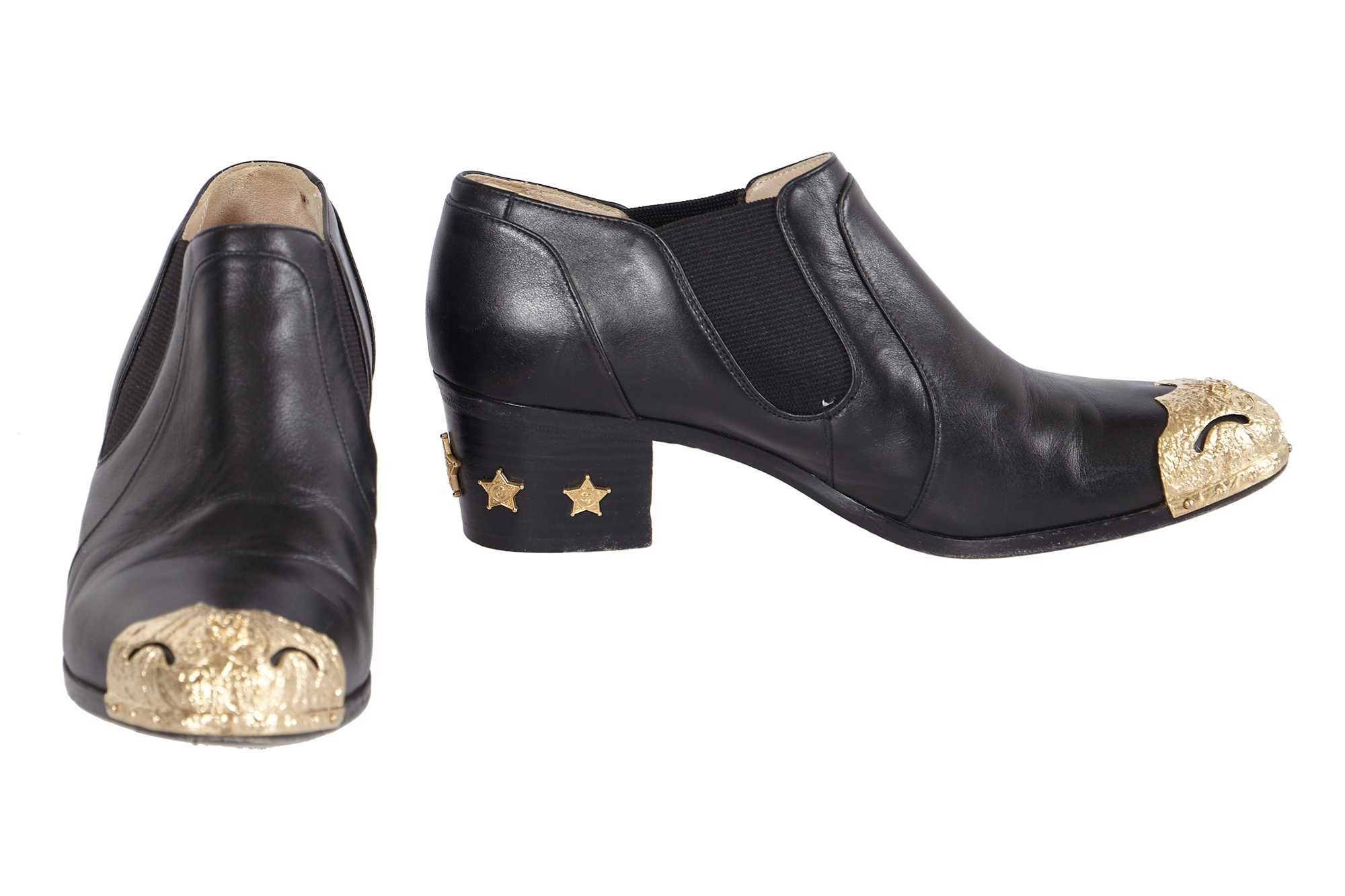 Lot 195 - A pair of Chanel by Karl Lagerfeld black leather boots, 'Paris-Dallas' collection, Métiers d'Art, Pre-Fall 2014
