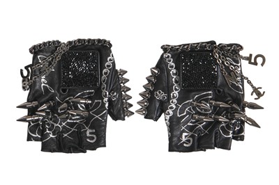 Lot 24 - A pair of Chanel by Karl Lagerfeld little black mitts, 2000s