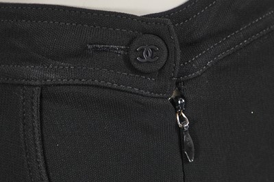 Lot 225 - A Chanel by Karl Lagerfeld black and pink jersey ensemble, 1990s-2000s