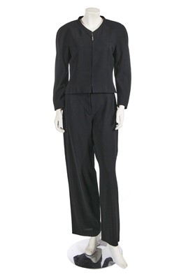 Lot 221 - A Chanel by Karl Lagerfeld black wool-blend crêpe suit, circa 2000