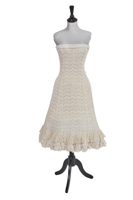 Lot 479 - A Christian Dior haute couture by Yves Saint Laurent white lace bridal dress, 'Silhouette de Demain' collection, Spring-Summer 1960
