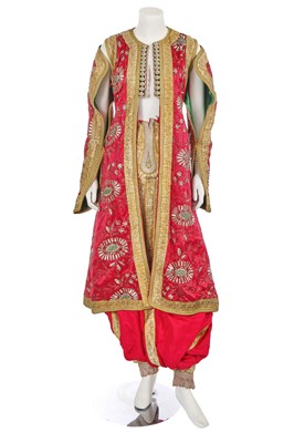 Lot 778 - An Albanian embroidered red and gold wedding ensemble, early 20th century