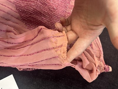 Lot 759 - A group of beaded flapper dresses in poor condition, 1920s