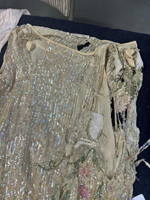 Lot 759 - A group of beaded flapper dresses in poor condition, 1920s